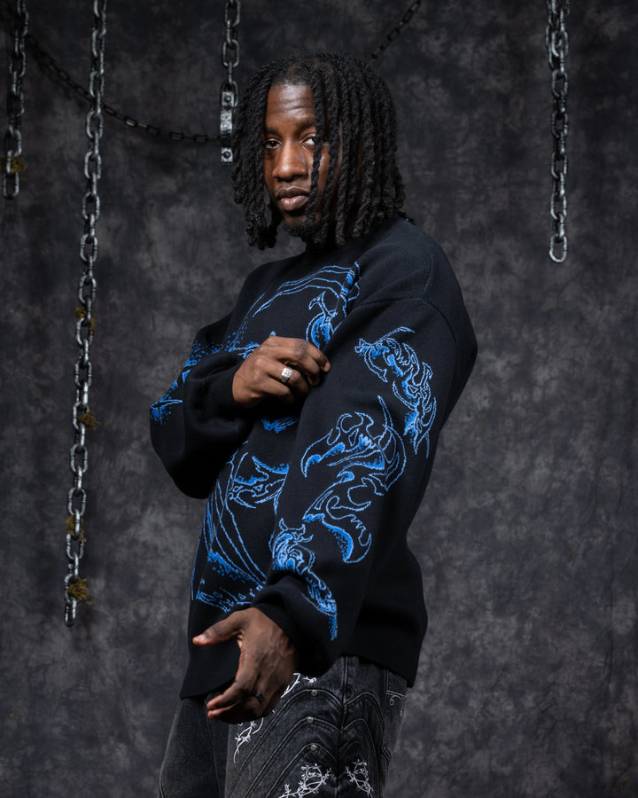 Ghostly Weapons Sweater