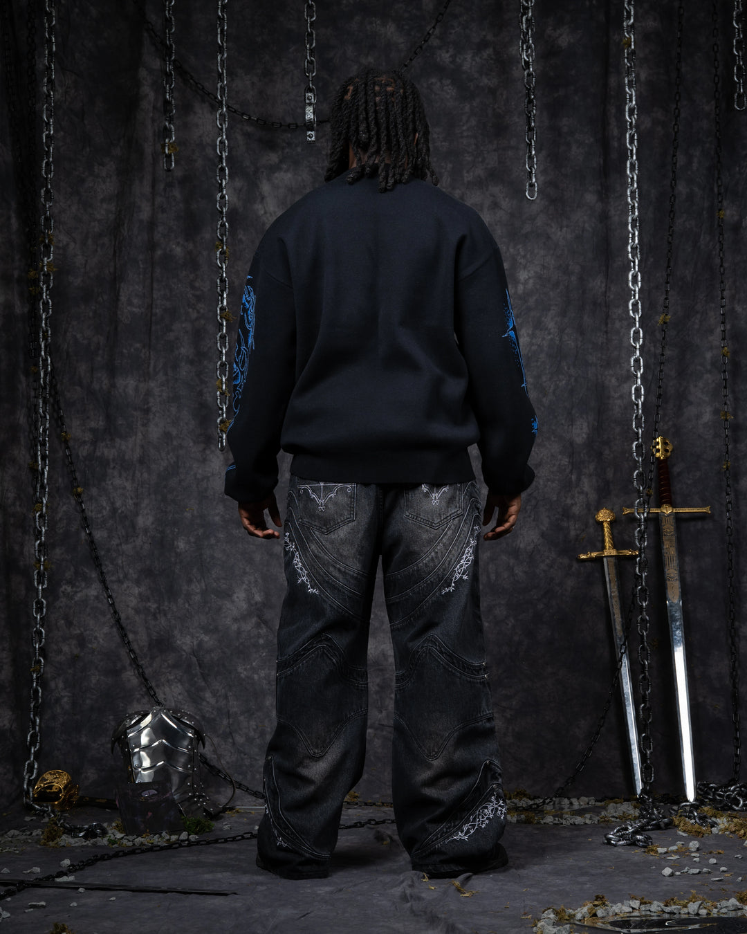 Ghostly Weapons Sweater