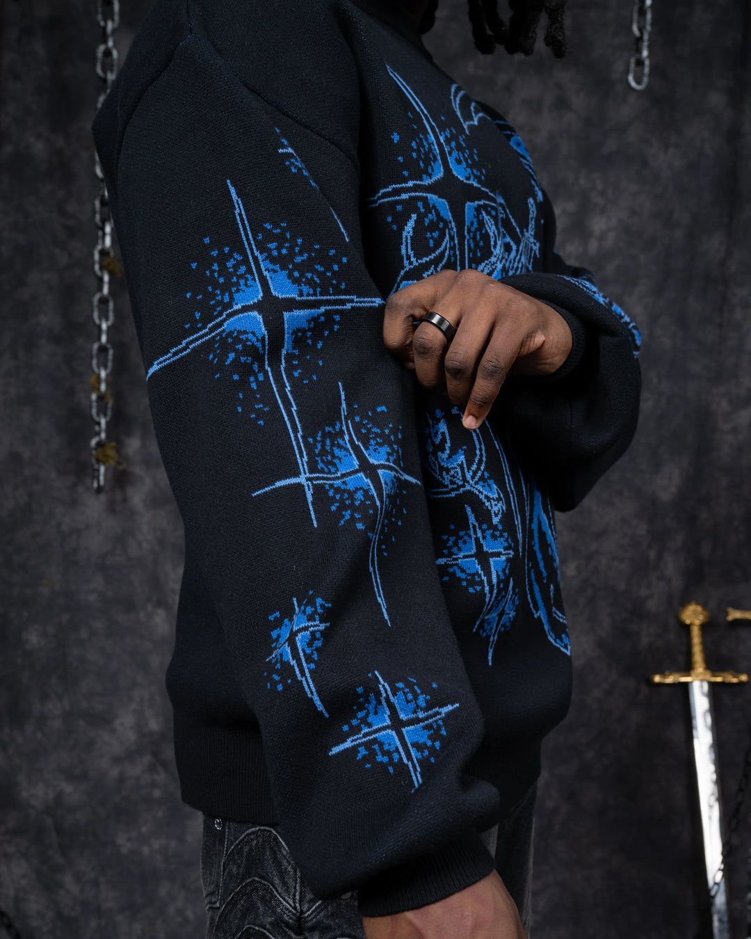 Ghostly Weapons Sweater