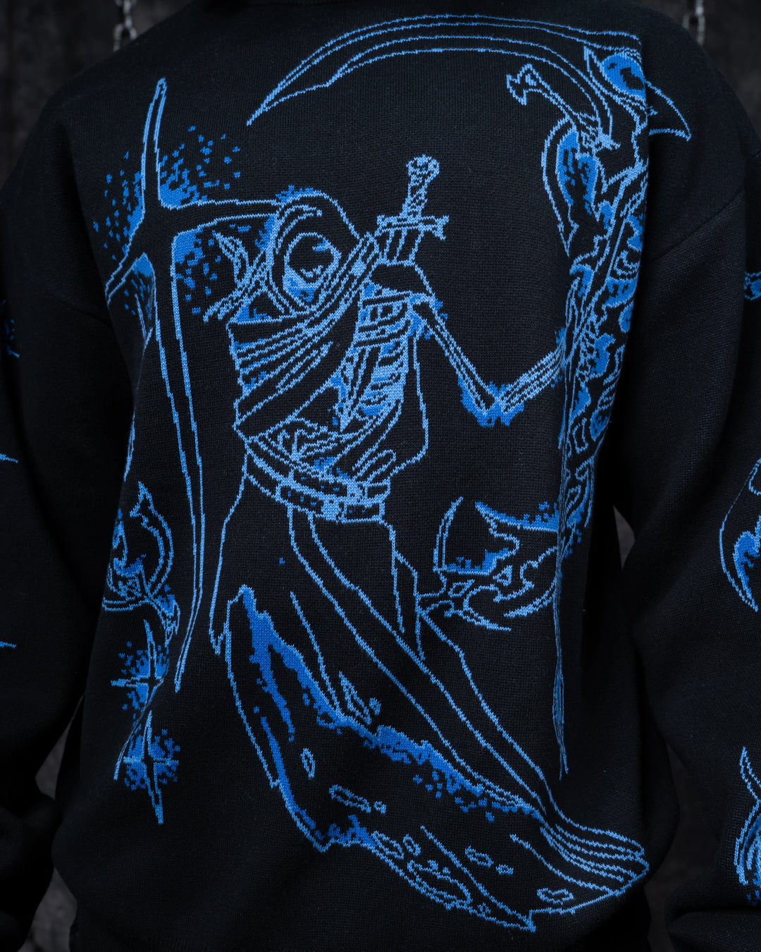 Ghostly Weapons Sweater