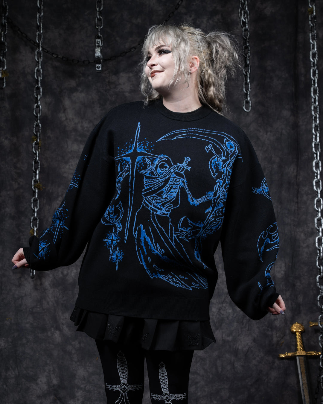 Ghostly Weapons Sweater