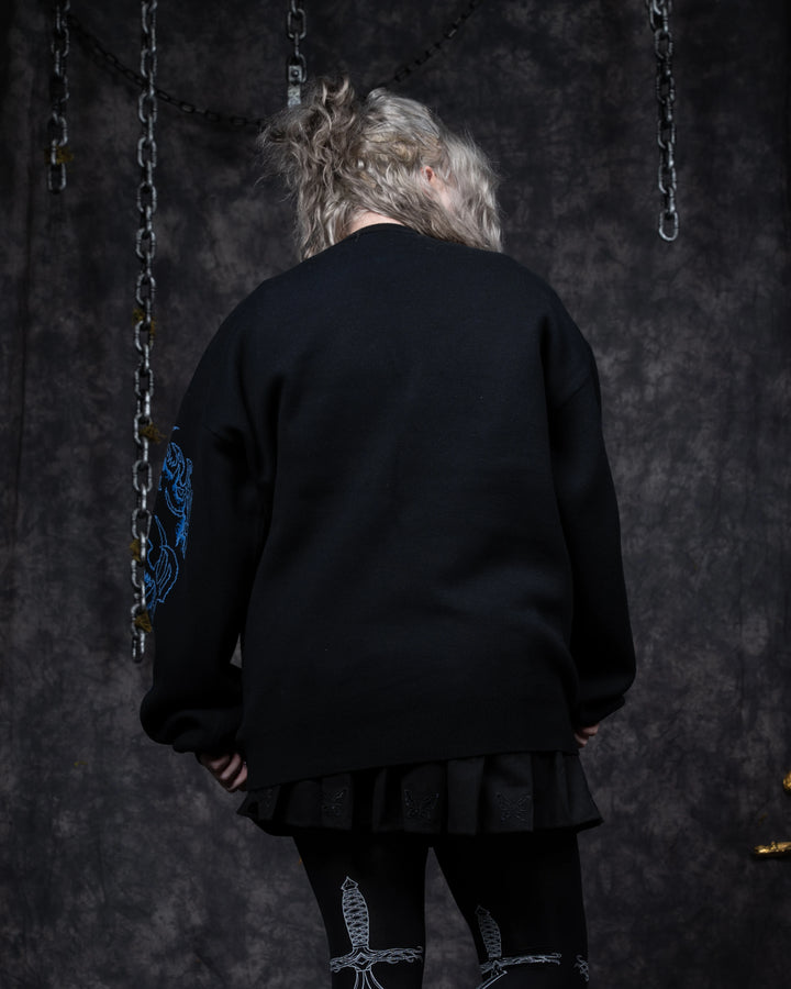 Ghostly Weapons Sweater