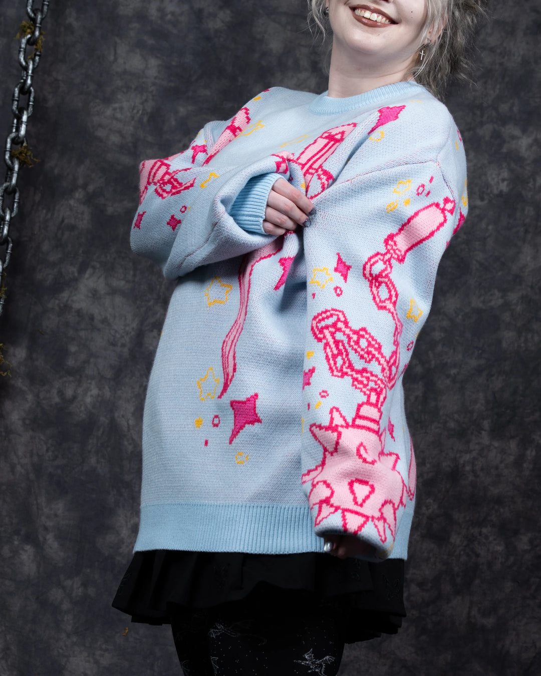Magical Weapon Sweater